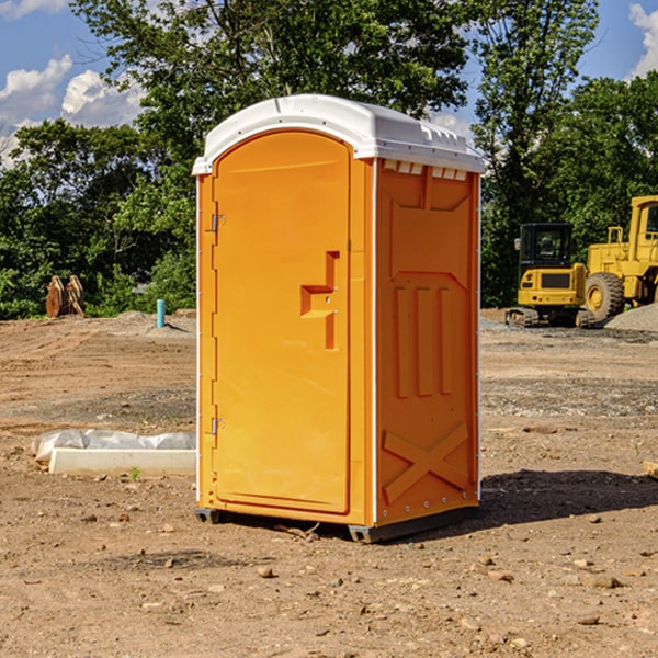 how often are the portable restrooms cleaned and serviced during a rental period in Winner